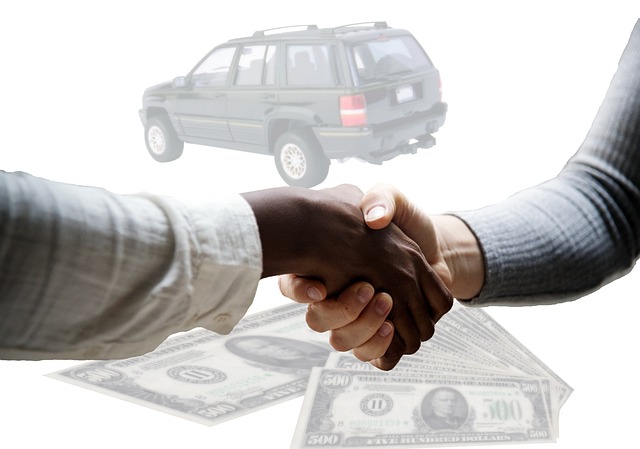 A handshake over a car sale